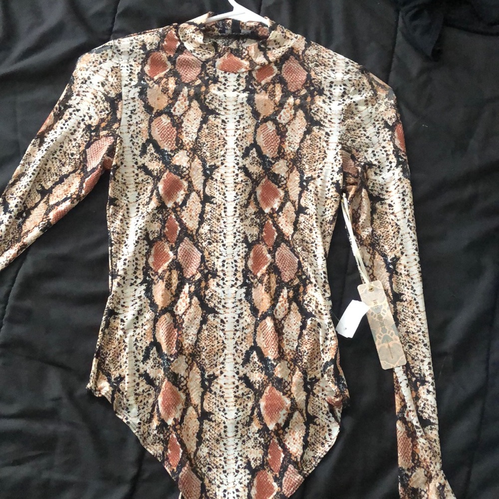 Neck hugging bodysuit